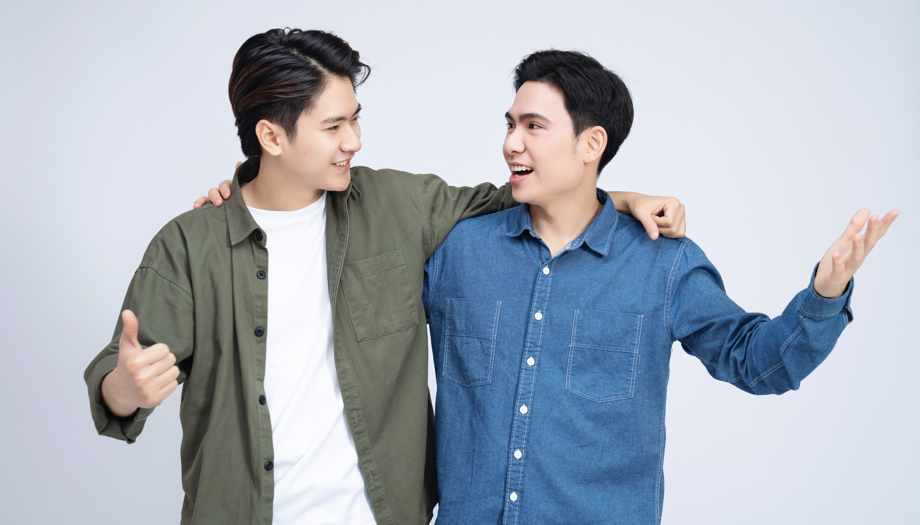 Two Asian Men on Background